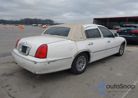 2000 Lincoln Town Car Cartier из США, поврежденный, VIN 1LNHM83W7YY867281